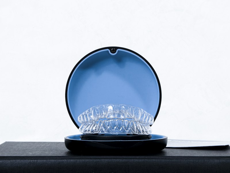 Clear retainer in an open storage case